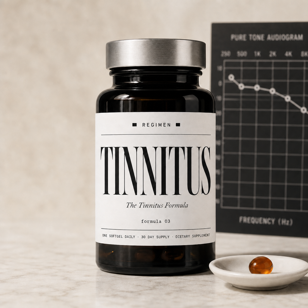 The REGIMEN Tinnitus Formula bottle on a quiet morning kitchen counter